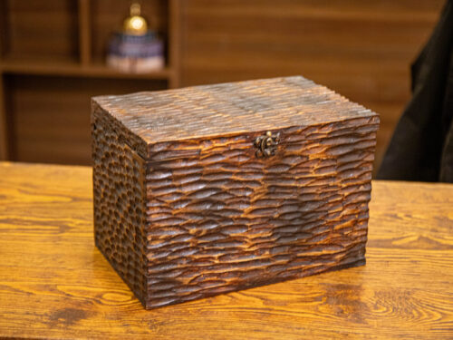 Storage box with a secret drawer