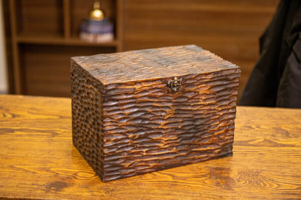 Storage box with a secret drawer