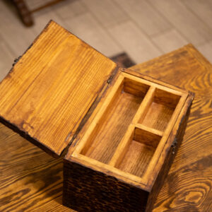 Storage box with a secret drawer