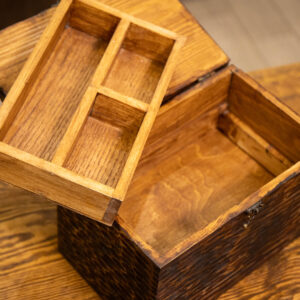 Storage box with a secret drawer