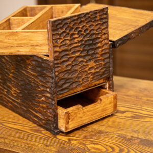 Storage box with a secret drawer