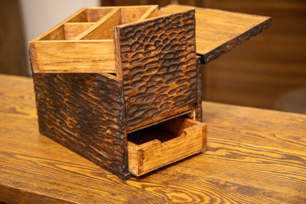 Storage box with a secret drawer