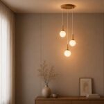 Modern wooden pendant light featuring three hanging glass bulbs